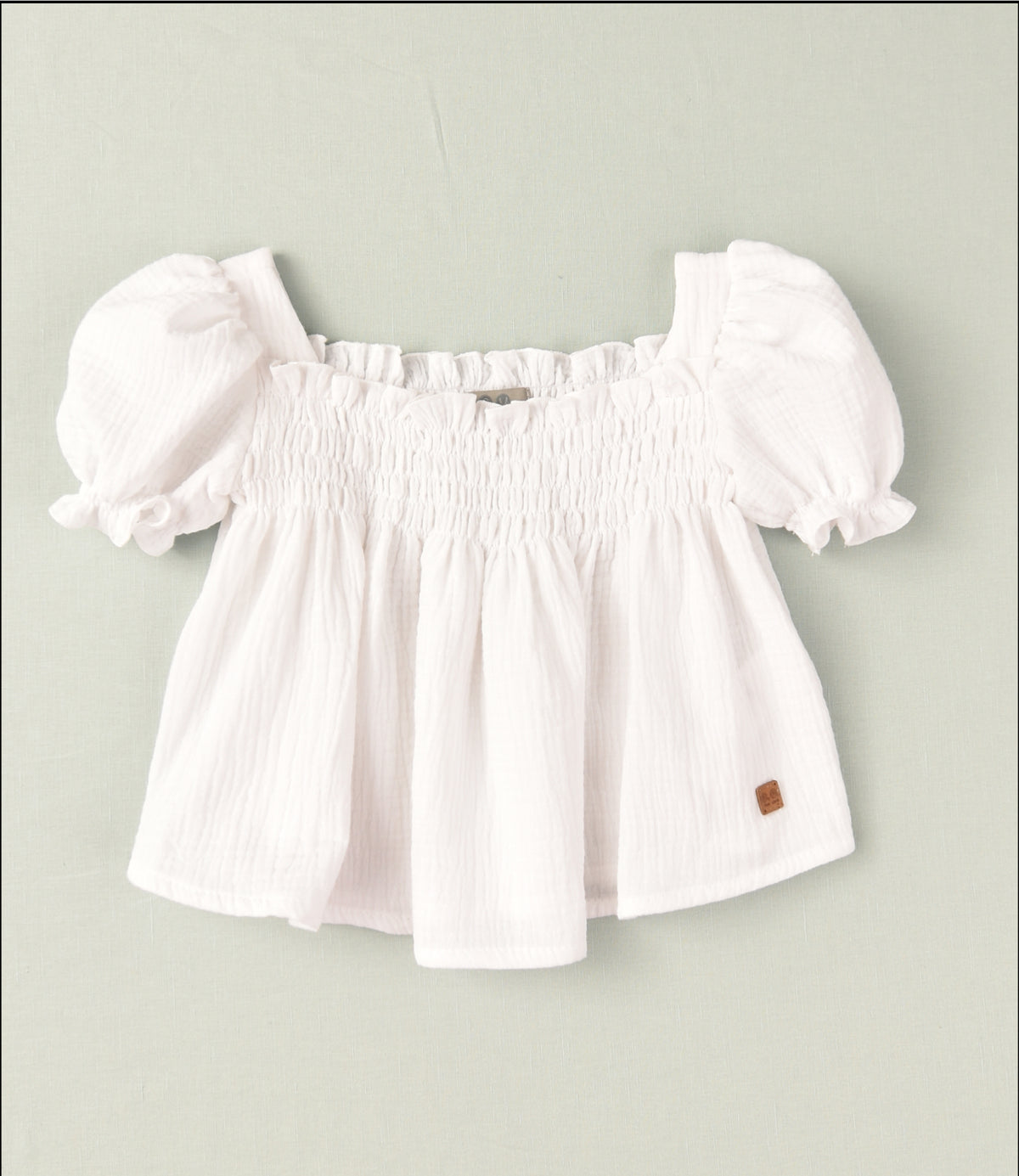 01-46076L Blusa de musselina lisa