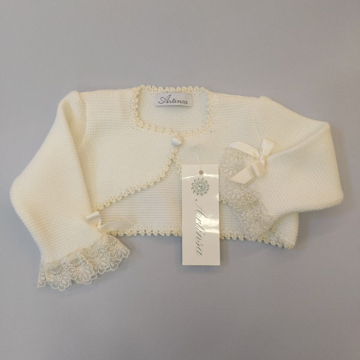 658A Bolero con colletto alla bebè e pizzo sulle maniche