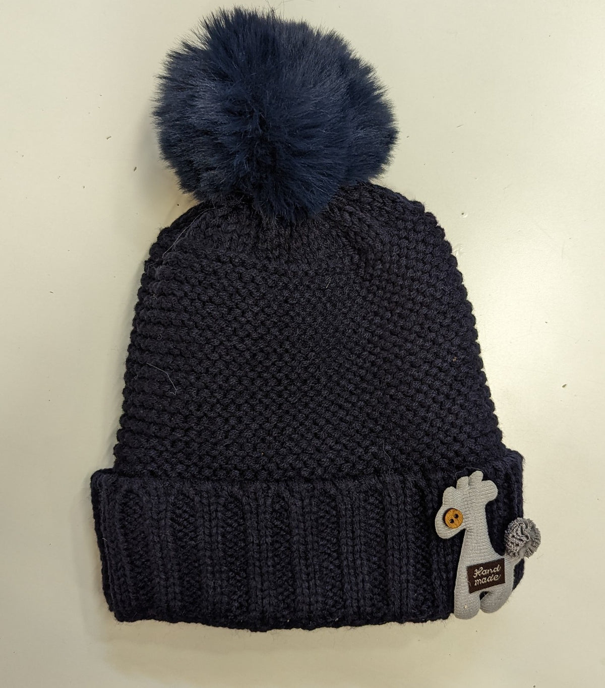 Gorro lana jirafa pompón pelo
