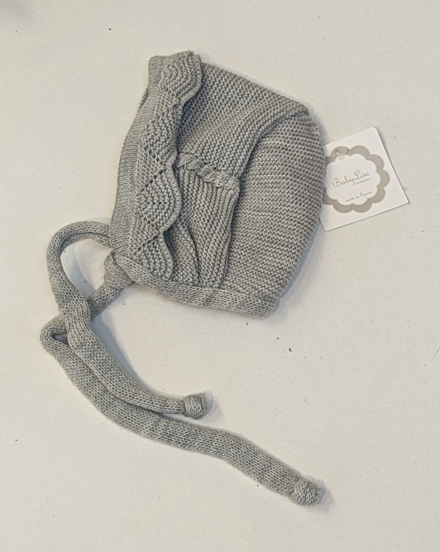 551 Capuche tricotée