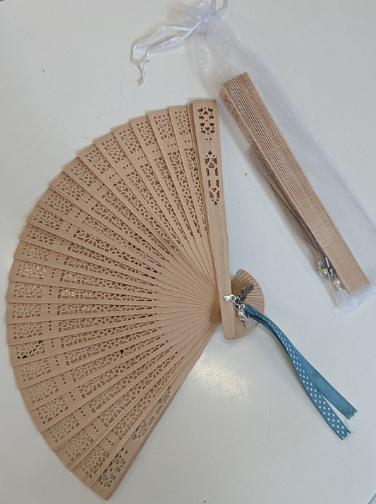 Perforated wooden fan